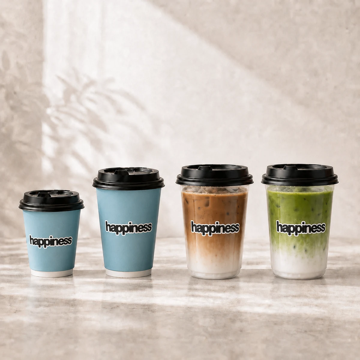 hot and iced coffee and tea in happiness cups